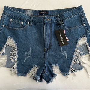 PRETTYLITTLETHING Plus Mid Extreme Thigh Rip Demin Short